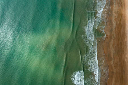 Aerial Perspective of Waves and Beach.の写真素材