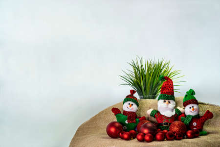 Santa Claus with the Christmas snowmen. Merry Christmas concept.