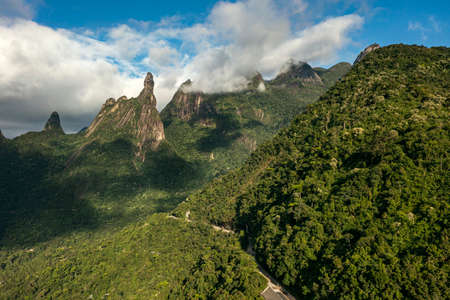 Beautiful landscape of mountains and morning mist. Mountain of the Finger of God. city of TeresÃ³polis, state of Rio de Janeiro, Brazil, South America.の写真素材