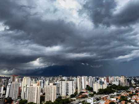 The storm is coming from the city. Sao Paulo, Itaim Bibi district, Brazil.