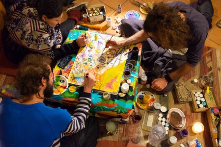Sicily, Italy - February 08, 2016: Group of artists making a collaborative painting in Catania.のeditorial素材