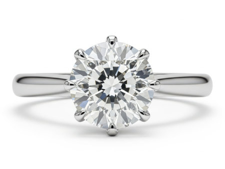 A stunning solitaire diamond engagement ring set in platinum, showcasing a brilliant round-cut diamond as the centerpiece.の素材