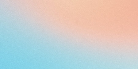 Subtle gradient background featuring soft pastel blends of light blue and peachの写真素材