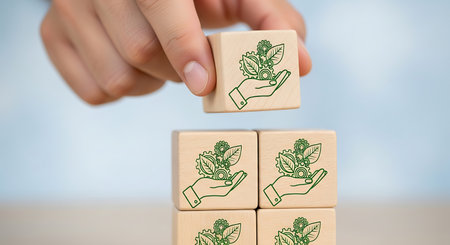 Wooden blocks show sustainable growth, environmental responsibility.の素材