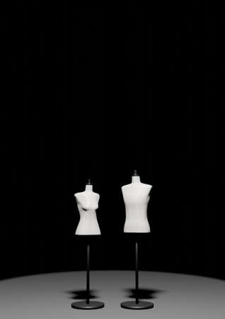 3DCG rendering of two male and female Torso mannequins standing in the darkの写真素材