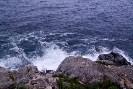 Sea waves on a cloudy dayの写真素材