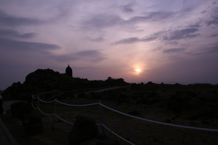 Sunset at the top of the hill in Jeju Island, South Koreaの写真素材