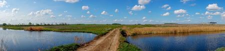 Panorama landscape with a river and a horizon