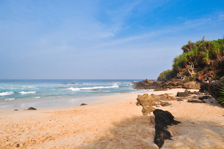 Beautiful Morning Sight and Large Boulders on the Beachの写真素材