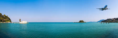 Panoramic view from Corfu Airport Planespotting Spot on landing plane above Mediterranean Seaの写真素材