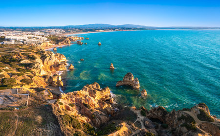 Aerial view of coastline at Lagos, Algarve, Portugalの写真素材