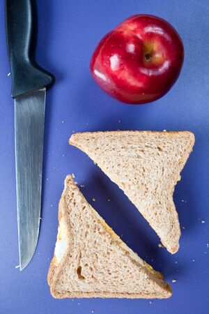 Healthy egg sandwich for lunch on  a purple boardの写真素材