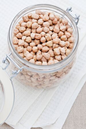 Chick peas in a jarの写真素材