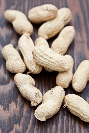 peanuts in shells otherwise known as monkey nutsの写真素材