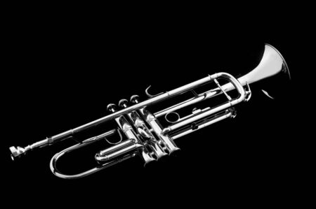 Silver trumpet on black backgroundの写真素材