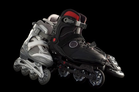 Rollerblades isolated on black