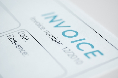 Close-up picture of an invoice, light blue tint.の写真素材