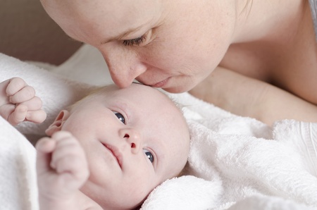 Close up of a newborn baby and his motherの写真素材