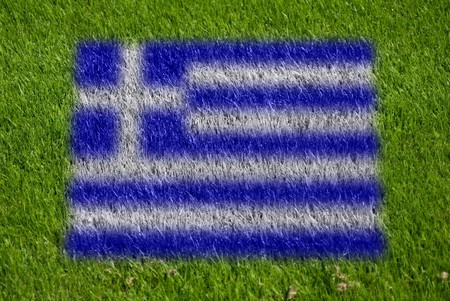 flag of greece on grass with sprayの写真素材