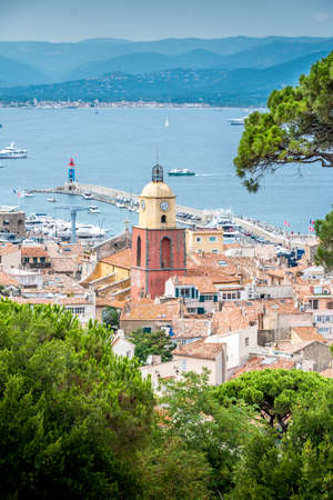 Saint-Tropez and its fishing port and its yachts in summer in Franceの写真素材