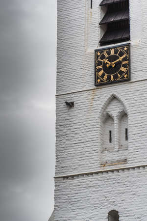 White church in Noordwijkerhout in the Netherlands with cloudy sky