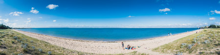 Panorama of the Plage de la Phibie on the islande of OlÃ©ron, under a beautiful blue sky in France