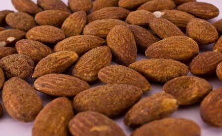 lots of tasty almonds roasted in saltの写真素材
