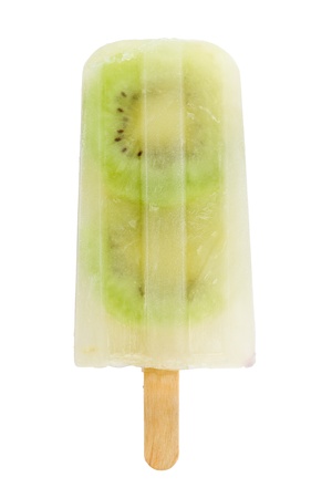 Homemade ice cream with lime juice and fresh slices of kiwi fruit against white background.の写真素材