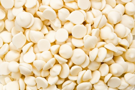 Background texture of white chocolate chips.の写真素材