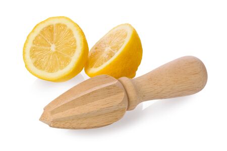 Wooden lemon juicer, or reamer, with a sliced lemon on white background.の写真素材