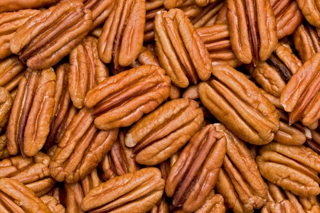 Background texture of shelled pecans.