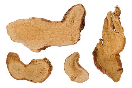 Composite of several slices of dried galangal, or blue ginger, used in thai cooking.の写真素材