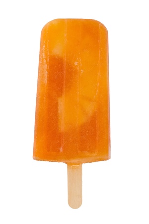 Homemade popsicle made with papaya juice and pineapple against white background.の写真素材