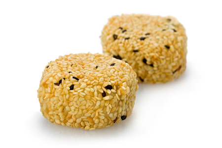 Sesame Mochi, or rice cake against a white background の写真素材
