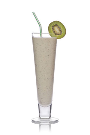 Kiwi fruit smoothie in a glass with a straw against a white background.の写真素材