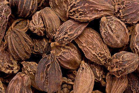 Background texture of several black cardamom pods.の写真素材