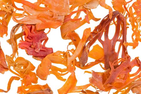 Background texture of pieces of dried mace, the covering of the nutmeg seed.