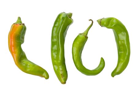 Four whole, fresh, green Hatch chile peppers against a white background.の写真素材