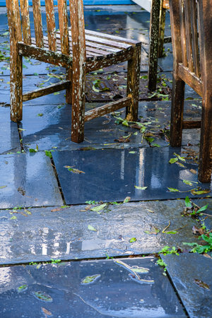A Rain-Soaked Patio at the Old Farmhouseの写真素材