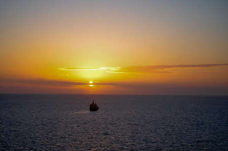 Ship in sunsetの写真素材