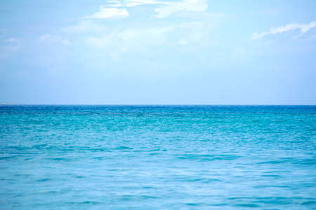 Horizon separating sea and blue skyの写真素材