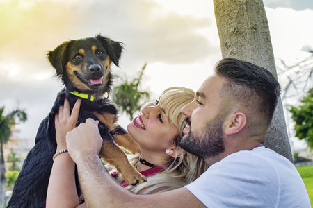 Couple in love with their dog.