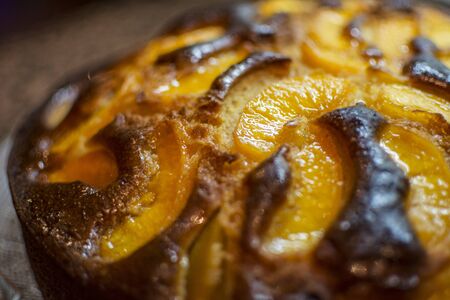 Close-up of a homemade cake with orange flavor.の写真素材
