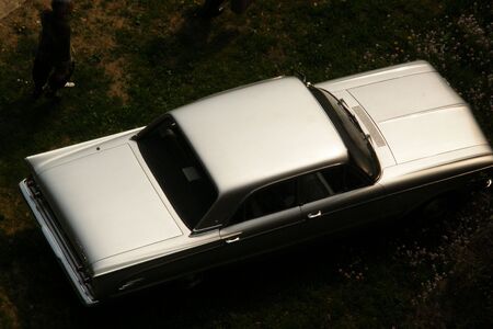 Silver car on a dark background