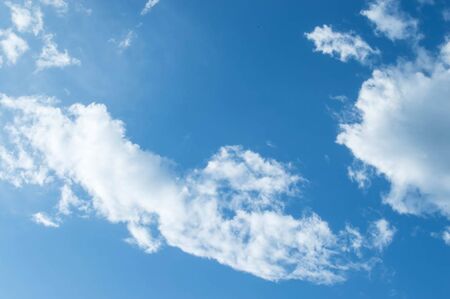 blue sky background with tiny cloudsの写真素材