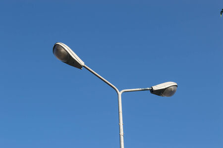 Street light on blue skyの写真素材