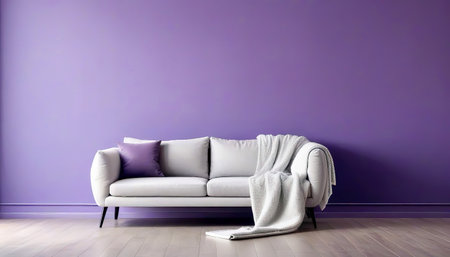 Sofa and pouf covered with blanket against purple wall with copy space. Minimalist interior design of modern living room.の素材