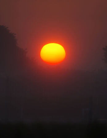 Misty sunriseの写真素材