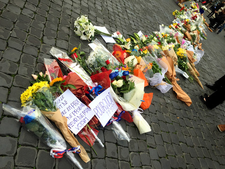 Rome, Italy - November 14, 2015:  Flowers left in front of the french embassy in Rome in memory of the victims of terrorist attacks in Parisのeditorial素材