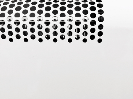 close up of a convector that seems a white spotted backgroundの写真素材